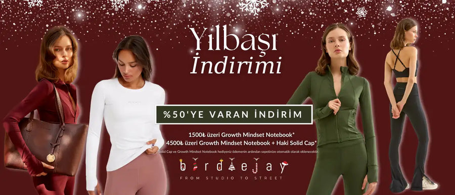 Altın tonunda yuvarlak tokalı kahverengi deri çanta.