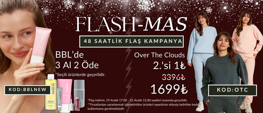 Pembe ve beyaz cilt bakımı ürünü tüpü