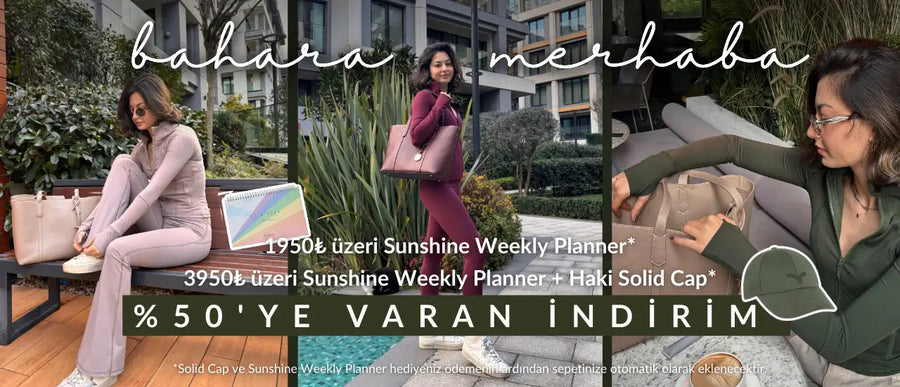 Yapısal tasarıma ve üst saplı bej deri tote çanta.